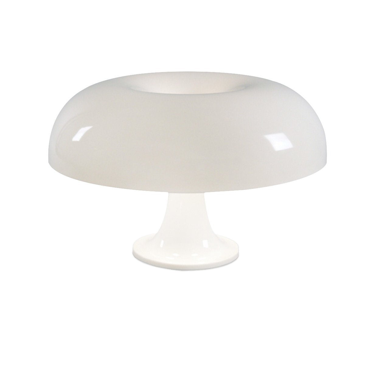 Lampe de chevet forme champignon blanche posée sur une table de nuit